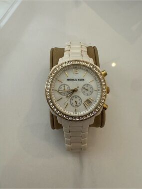 Michael Kors White Ceramic Watch with Gold Accents and Crystal Bezel